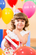 pretty girl  with colorful balloons and gift