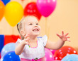 Foto: joyful kid girl on birthday party joyful kid girl on birthday party