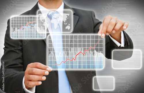 Photo: Businessman creating graphic chart Businessman creating graphic chart