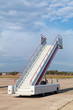 Photo: A gangway of the plane on the runway A gangway of the plane on the runway