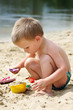 Photo: Child playing in the sand Child playing in the sand