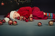 Small boy in santa hat sleep