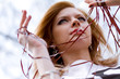 Young woman with a tape