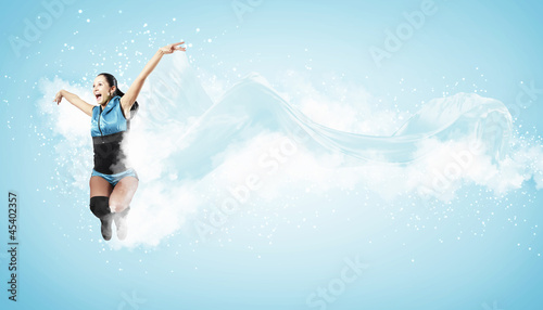 Photo: Young woman dancer. With lights effect. Young woman dancer. With lights effect.