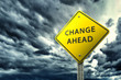 Illustration: Change ahead traffic sign over stormy sky Change ahead traffic sign over stormy sky