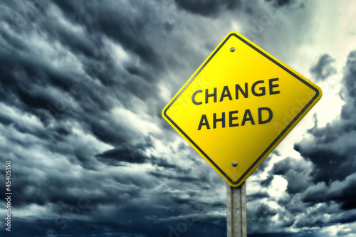 Illustration: Change ahead traffic sign over stormy sky Change ahead traffic sign over stormy sky