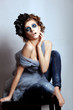 Woman artistic face with bright blue makeup. Fantasy, glamour