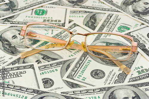 Photo: Glasses on money Glasses on money