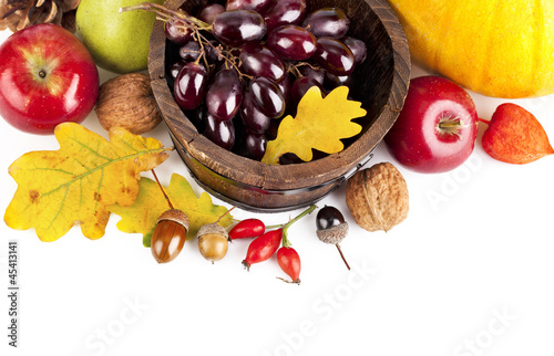Photo: autumnal harvest fruits and vegetables with yellow leaves autumnal harvest fruits and vegetables with yellow leaves