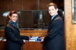 Casual shot of young help desk executives