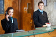 Profile shot of attractive executives at the reception