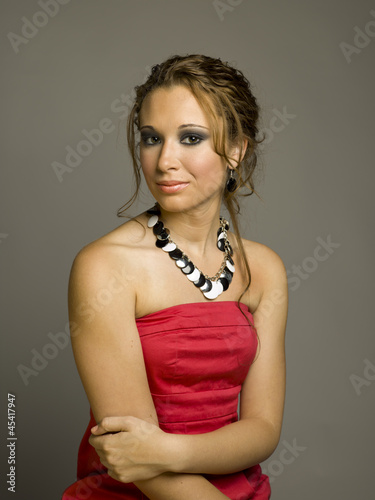 Photo: smiling girl on taupe smiling girl on taupe