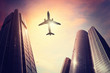 Airplane over a Big City
