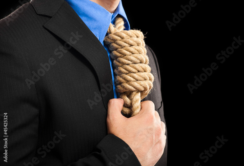 Photo: Businessman with a rope in place of a collar: tax pressure Businessman with a rope in place of a collar: tax pressure