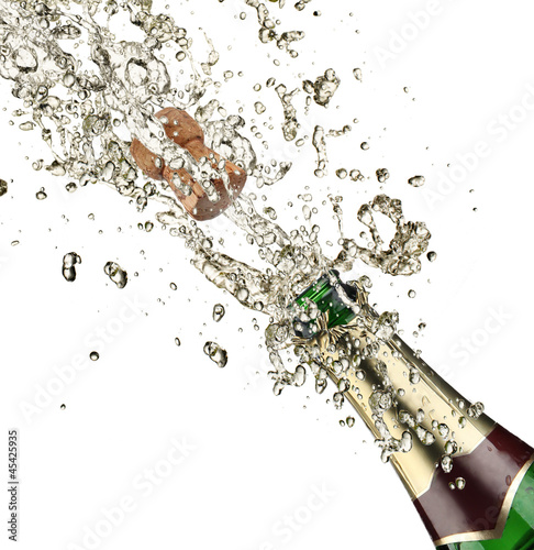 Photo: Close-up of champagne explosion Close-up of champagne explosion