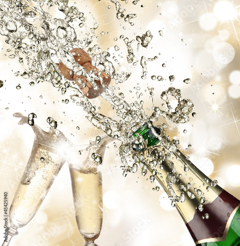 Photo: Close-up of champagne explosion Close-up of champagne explosion