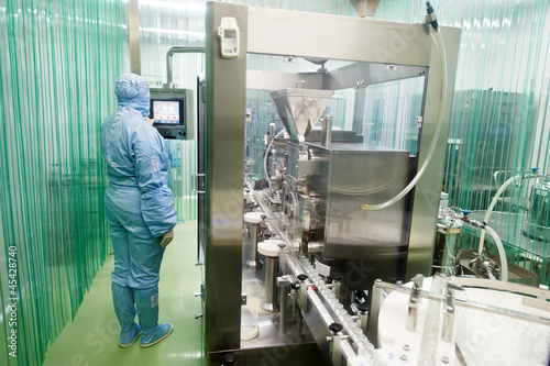 Photo: pharmaceutical factory worker pharmaceutical factory worker