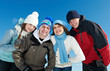 group of happy young people in winter