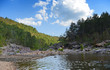 River Flowing During Sunny Afternoon