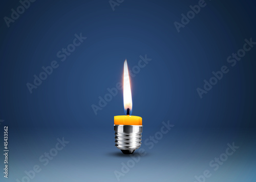 Photo: Wax candle into lighting bulb Wax candle into lighting bulb