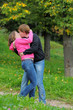 Young beautiful couple kissing oudoors