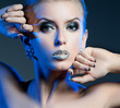 Luxury woman with rhinestones on her lips