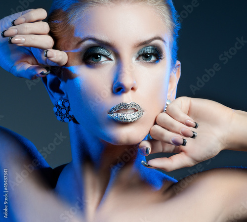 Photo: Luxury woman with rhinestones on her lips Luxury woman with rhinestones on her lips