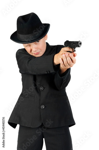 Photo: young gangster holding a gun and aim young gangster holding a gun and aim