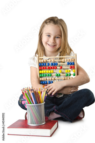 Photo: Girl with books and abacus Girl with books and abacus