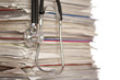 Foto: Stack of papers with stethoscope Stack of papers with stethoscope