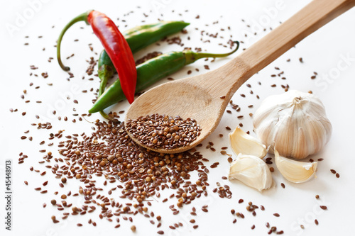 Photo: Cayenne peppers, flax seeds, coriander and garlic Cayenne peppers, flax seeds, coriander and garlic