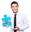 business concept homme avec puzzle bleu