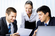 Three businesspeople working at office