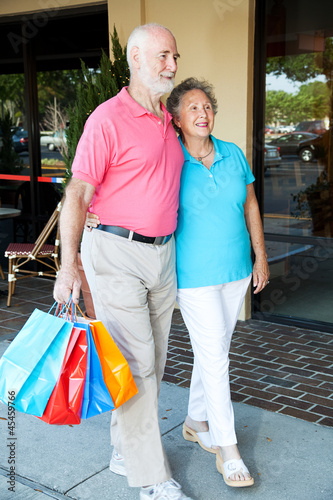 Photo: Happy Senior Couple Goes Shopping Happy Senior Couple Goes Shopping