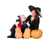  baby boy and mother in black halloween cloak