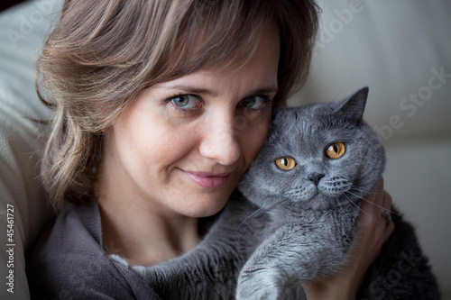 Photo: Pretty young woman with a cat Pretty young woman with a cat