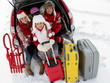 Family with baggage ready for the travel for winter holiday