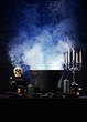 A Halloween composition of candles, sorcery and a skull