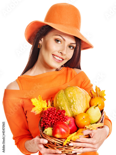 Photo: Woman holding autumn basket. Woman holding autumn basket.