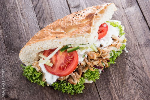 Photo: Pita and Kebab on wood Pita and Kebab on wood