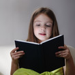 Photo: beauty girl read book on sofa beauty girl read book on sofa