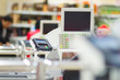 Multiple cash-desks with cashier and terminal in supermarket Multiple cash-desks with cashier and terminal in supermarket