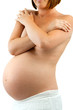Pregnant woman showing tummy.