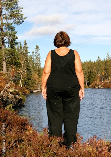 Photo: Obese woman by a tarn Obese woman by a tarn