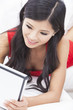 Beautiful Asian Chinese Woman Using Tablet Computer