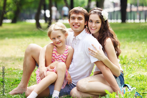 Photo: happy family having fun outdoors happy family having fun outdoors