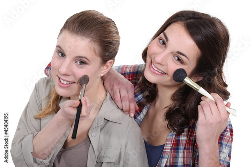 Photo: Two women pampering themselves Two women pampering themselves