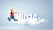 Photo: young woman playing on electro guitar and jumping young woman playing on electro guitar and jumping
