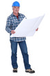 mature carpenter consulting blueprints