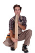 Man checking cabinet door